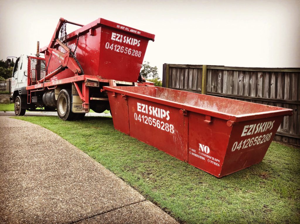 Truck dropping off skip bins around the Gold Coast